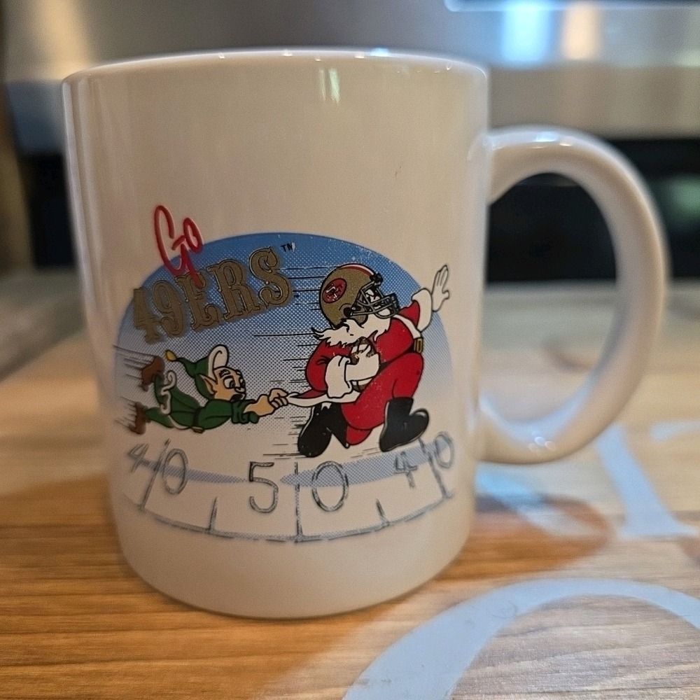San Francisco 49ers Christmas Coffee‎ Mug. Unbranded. Elf Chasing Santa Claus